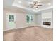 Spacious living room with fireplace and hardwood floors at 652 Shawnee Dr, Louisburg, NC 27549