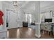 Bright and airy entryway with hardwood floors and view of living room at 7210 Roberts Rd, Cary, NC 27519