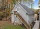 Detached two-car garage with stairs to upper level at 7210 Roberts Rd, Cary, NC 27519