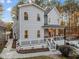 Gray two-story house with wrap-around porch, deck, and walkway at 7210 Roberts Rd, Cary, NC 27519