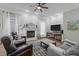 Spacious living room with fireplace and built-in media console at 7210 Roberts Rd, Cary, NC 27519