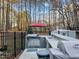 Outdoor kitchen area with a grill and sink, perfect for entertaining at 7210 Roberts Rd, Cary, NC 27519