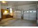 Spacious two-car garage with built-in cabinets and workshop area at 7217 Blannie Farms Ln, Willow Springs, NC 27592
