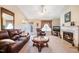 Spacious living room with fireplace and ample natural light at 7217 Blannie Farms Ln, Willow Springs, NC 27592