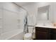Clean bathroom with tub, shower, and dark vanity at 80 Bella Vita Way, Angier, NC 27501