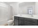 Double vanity bathroom with a shower/tub combo at 80 Bella Vita Way, Angier, NC 27501