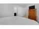 Main bedroom with ensuite bathroom access and an armoire at 80 Bella Vita Way, Angier, NC 27501