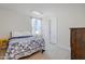 Bright bedroom with a double bed and window at 80 Bella Vita Way, Angier, NC 27501