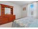 Bedroom with dresser and large window at 80 Bella Vita Way, Angier, NC 27501
