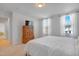 Main bedroom with large windows and an armoire at 80 Bella Vita Way, Angier, NC 27501