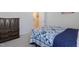 Bedroom with a bed, dresser, and access to a hallway at 80 Bella Vita Way, Angier, NC 27501