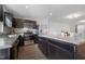 Modern kitchen with stainless steel appliances and an island at 80 Bella Vita Way, Angier, NC 27501