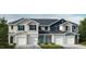 Three-unit townhome building, featuring attractive, modern design and two-car garages at 1113 Mountain Crown St, Durham, NC 27703
