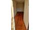 Living room with hardwood floors and access to other rooms at 1404 N Main St, Roxboro, NC 27573