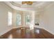 Bright bedroom featuring hardwood floors and abundant natural light at 1732 Font Hills Ln, Knightdale, NC 27545