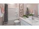 Bathroom with tub, shower, and modern vanity at 2243 Horton Park Drive, Apex, NC 27539