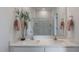 Bathroom boasts double sinks, quartz countertops, and a glass-enclosed shower at 2243 Horton Park Drive, Apex, NC 27539