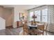 Bright dining room with round table and wood chairs at 2243 Horton Park Drive, Apex, NC 27539