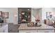 Open concept kitchen with island and wood shelving at 2243 Horton Park Drive, Apex, NC 27539