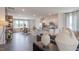 Modern kitchen with granite countertops, white cabinets, and island at 2243 Horton Park Drive, Apex, NC 27539