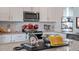 Kitchen island with granite countertop and stainless steel scale at 2243 Horton Park Drive, Apex, NC 27539