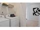 Laundry room with washer, dryer, and shelving unit at 2243 Horton Park Drive, Apex, NC 27539