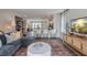 Open concept living room with kitchen and dining area visible at 2243 Horton Park Drive, Apex, NC 27539