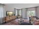 Cozy living room with ample natural light and comfortable seating at 2243 Horton Park Drive, Apex, NC 27539