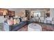 Open living room showcasing a sectional sofa and kitchen island at 2243 Horton Park Drive, Apex, NC 27539