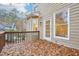 Back deck with wood railings and access to backyard at 25 Porters Glen Pl, Durham, NC 27713