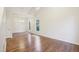 Bright dining room with hardwood floors and a chandelier at 25 Porters Glen Pl, Durham, NC 27713