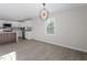 Kitchen with island and modern light fixture at 2513 Little John Rd, Raleigh, NC 27610