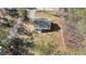 Aerial view of a newly constructed single story home and surrounding area at 31 Bourbon St, Fuquay Varina, NC 27526