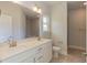 Double vanity bathroom with a shower and tile floor at 51 Sunburst Ct, Fuquay Varina, NC 27526