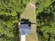 Home features a private backyard and wooded surroundings at 517 Shawnee Dr, Louisburg, NC 27549