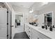Modern bathroom with double vanity and walk-in closet at 517 Shawnee Dr, Louisburg, NC 27549