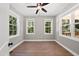 Bright office space with hardwood floors and multiple windows at 517 Shawnee Dr, Louisburg, NC 27549