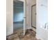Bathroom with walk-in shower, bathtub, and tile flooring at 54 Northwood Dr, Fuquay Varina, NC 27526