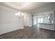 Dining room open to the kitchen with a view of the breakfast bar at 54 Northwood Dr, Fuquay Varina, NC 27526