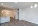 Open concept dining room and kitchen area with wood floors at 54 Northwood Dr, Fuquay Varina, NC 27526
