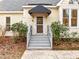 Front entrance with awning and steps at 602 Valen Ct, Chapel Hill, NC 27516