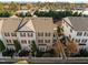Aerial view of townhouses and surrounding landscape at 1120 Renewal Place # 108, Raleigh, NC 27603