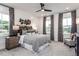 Spacious primary bedroom with a ceiling fan and sitting area at 1212 Holding Village Way, Wake Forest, NC 27587