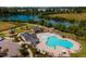 Community pool with a clubhouse and plenty of lounge chairs at 1212 Holding Village Way, Wake Forest, NC 27587