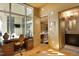 Bright home office with built-in desk and view to patio at 140 W Franklin St # 800, Chapel Hill, NC 27516