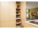 Well-organized kitchen pantry with ample shelving for storage at 140 W Franklin St # 800, Chapel Hill, NC 27516