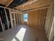 Unfinished upstairs bedroom with window at 150 Steppe Way, Garner, NC 27529