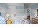 Bedroom with light blue and white color scheme and access to a hallway at 40 Saddle Mare St, Clayton, NC 27520