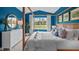 Spacious bedroom with large window and dresser at 40 Saddle Mare St, Clayton, NC 27520