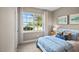 Spacious bedroom with large window and neutral decor at 40 Saddle Mare St, Clayton, NC 27520